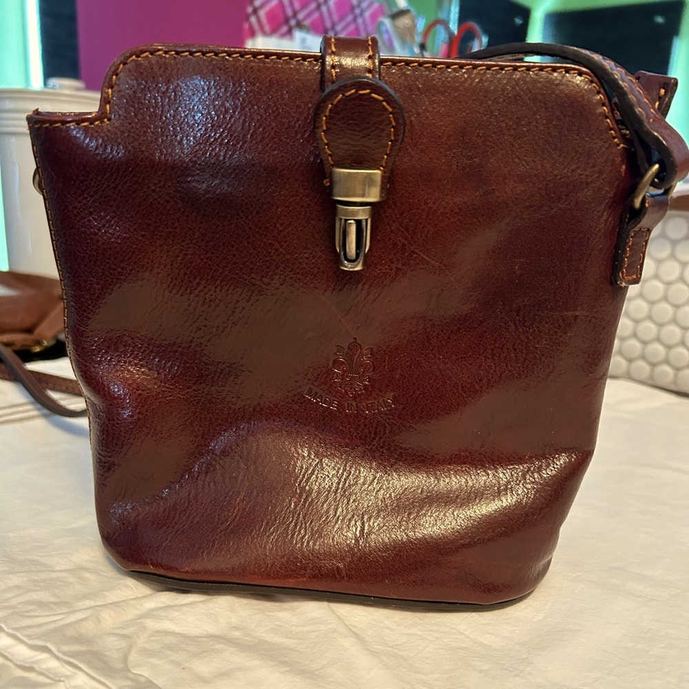 Womans shoulder bag,Gen leather,cognac brown, spot on front noted in picture